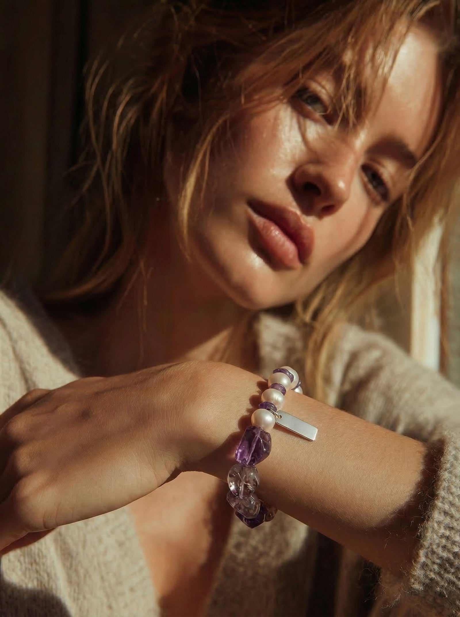 Serenity bracelet on neutral background — freeform amethyst with freshwater pearls